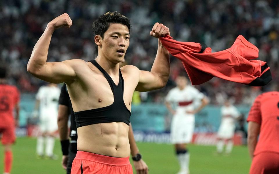 South Korea's Hwang Hee-chan celebrates after scoring his side's 2nd goal - AP