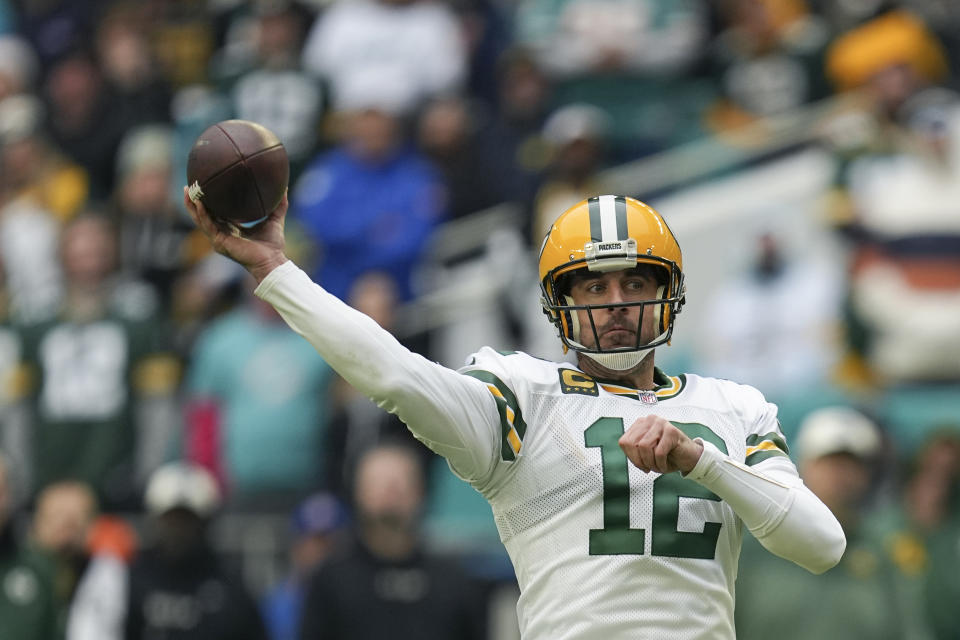 Green Bay Packers quarterback Aaron Rodgers (12) is trying to lead his team to a Christmas Day upset over the Miami Dolphins. (AP Photo/Jim Rassol)