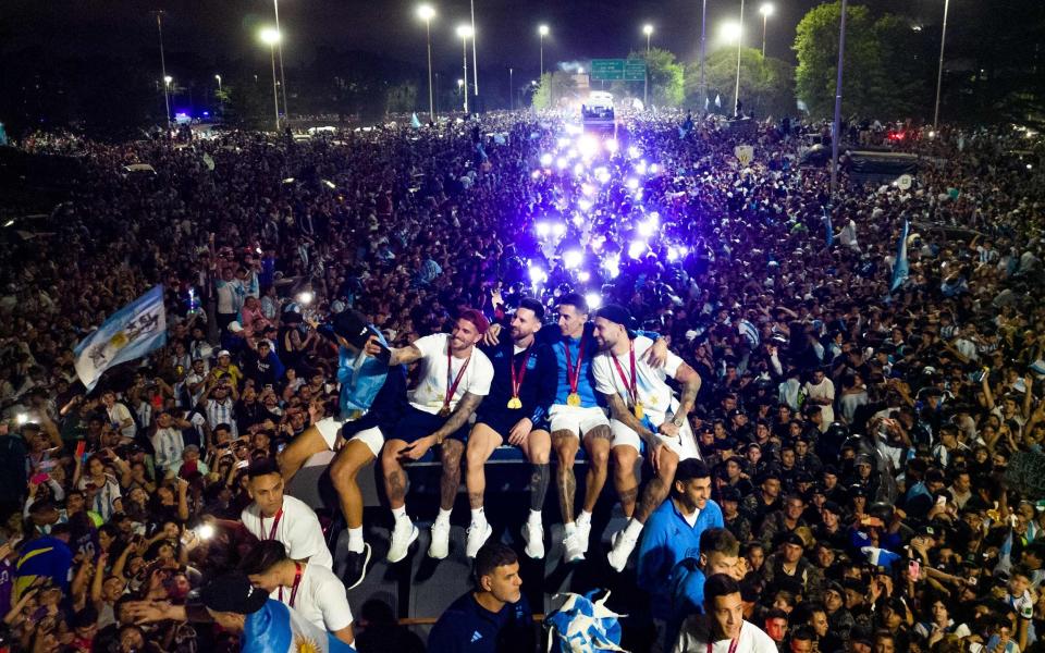 The players rightly got a heroes' welcome when they arrived back in Argentina - AFP via Getty Images/Tomas Cuesta