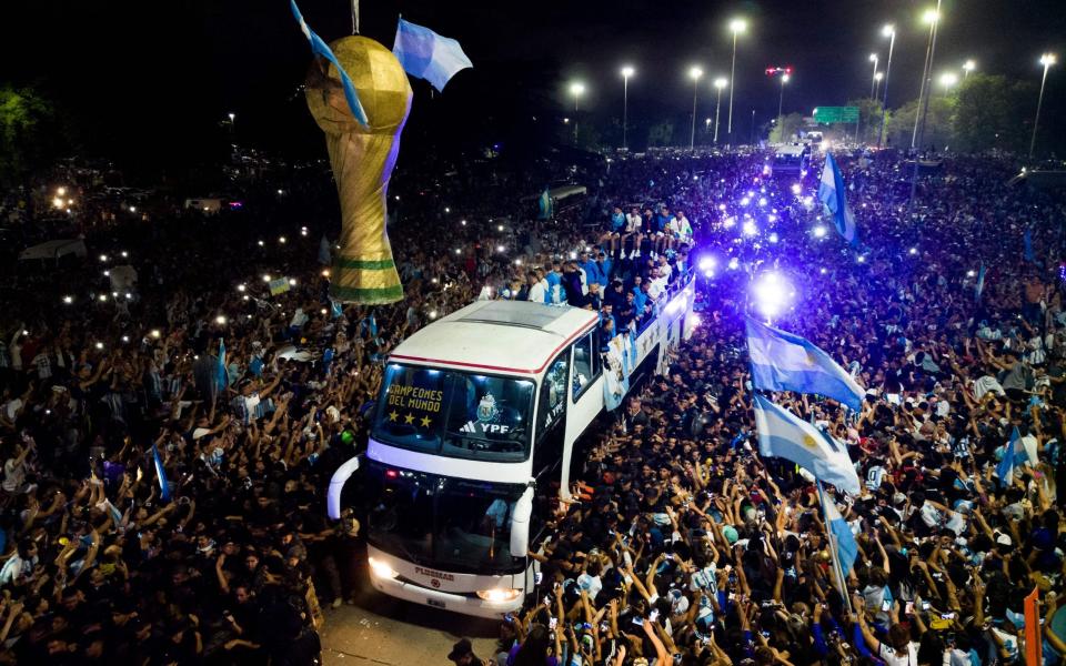 Fans lined the streets to cheer the World Cup winners - AFP vi Getty Images/Tomas Cuesta