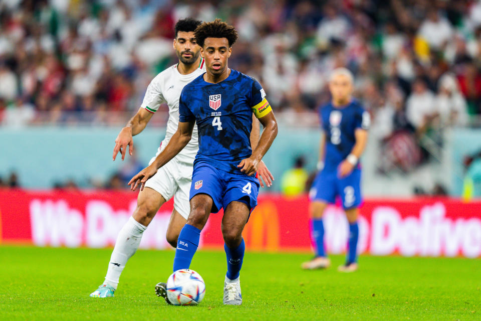 USA midfielder Tyler Adams controls the ball during a World Cup match against Iran on Nov. 29, 2022, at Al Thumama Stadium in Al Thumama, Qatar. (Photo by Richard Gordon/Icon Sportswire via Getty Images)