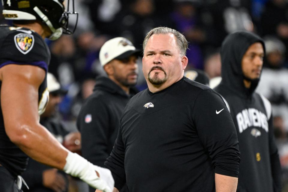 FILE - Baltimore Ravens offensive coordinator Greg Roman looks on during pre-game warm-ups before an NFL football game against the Pittsburgh Steelers, Sunday, Jan. 1, 2023, in Baltimore. Greg Roman is leaving Baltimore after four seasons as offensive coordinator for other opportunities after the Ravens' wild-card loss. Roman's agency, Athletes First, announced his decision before a Ravens news conference Thursday afternoon, Jan. 19, with coach John Harbaugh and general manager Eric DeCosta. (AP Photo/Terrance Williams, File)