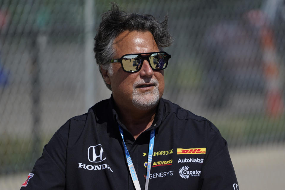 FILE - Team owner Michael Andretti looks on during practice for the IndyCar Detroit Grand Prix auto racing doubleheader on Belle Isle in Detroit, on June 11, 2021. If things had gone according to plan, Colton Herta would be in Miami preparing for the fifth Formula One race of his career. Instead, the 22-year-old Californian is headed to the inaugural Miami Grand Prix as a spectator. His boss, Michael Andretti, meanwhile, awaits any word whatsoever on his bid to start a Formula One team and bring a true American team to the grid. (AP Photo/Paul Sancya, File)