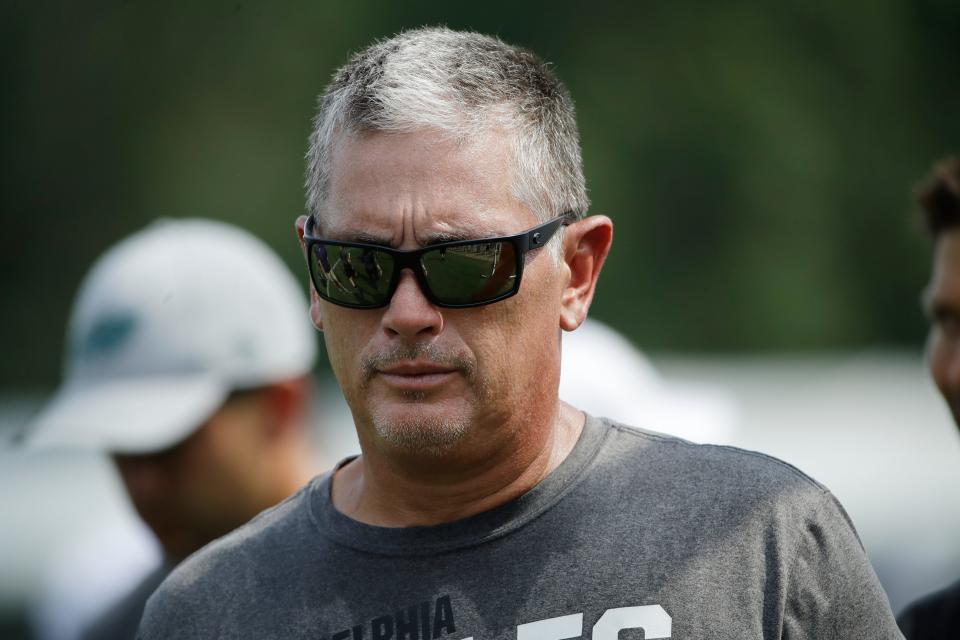 Philadelphia Eagles defensive coordinator Jim Schwartz walks off the field during a joint NFL football practice in Philadelphia, Monday, Aug. 19, 2019. (AP Photo/Matt Rourke)