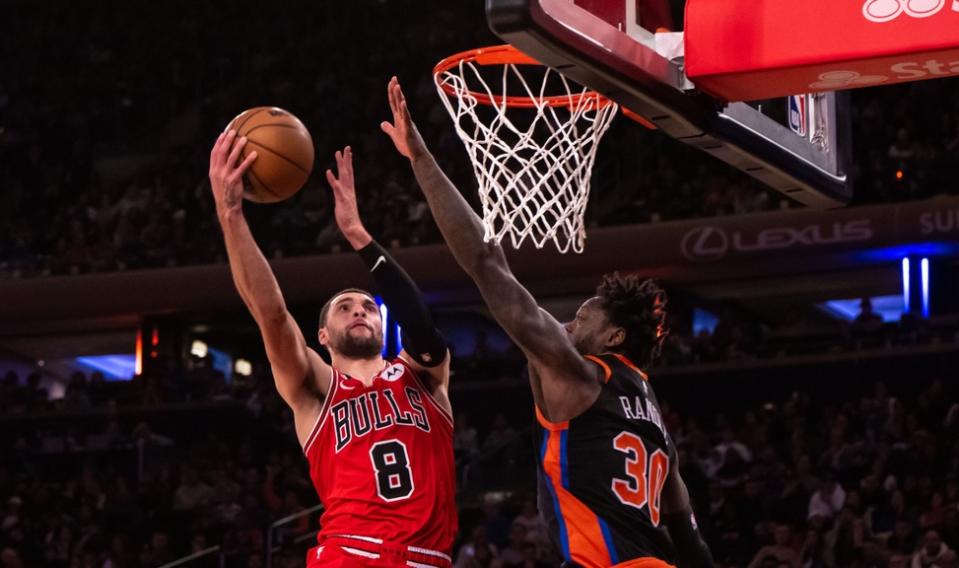 Chicago Bulls guard Zach LaVine (8) drives to the basket as New York Knicks forward Julius Randle (30) defends during the fourth quarter at Madison Square Garden.