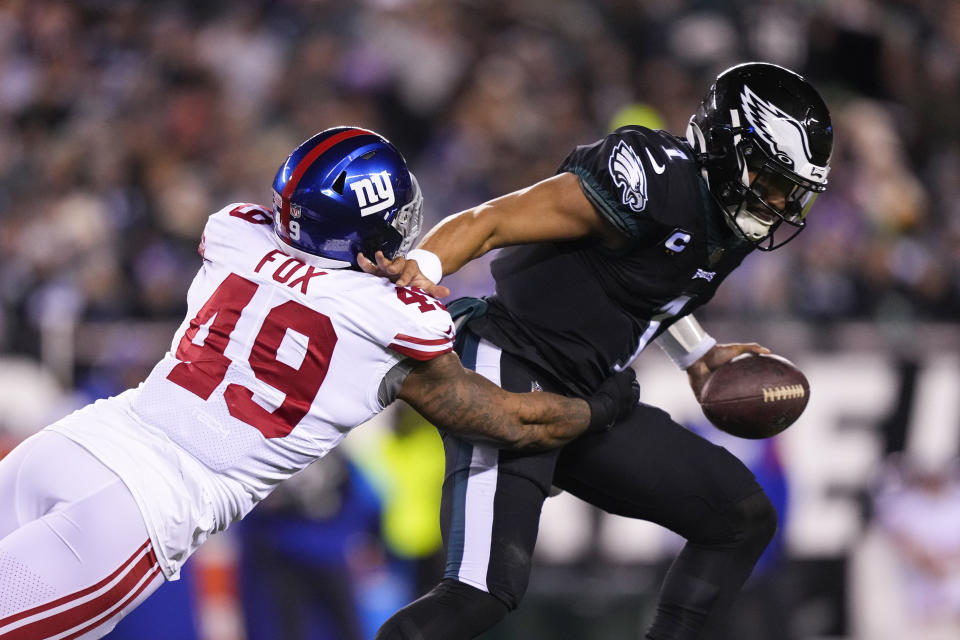 Jalen Hurts and the top-seeded Eagles look to reach the NFC title game against the Giants in the NFL divisional round. (AP Photo/Matt Slocum)