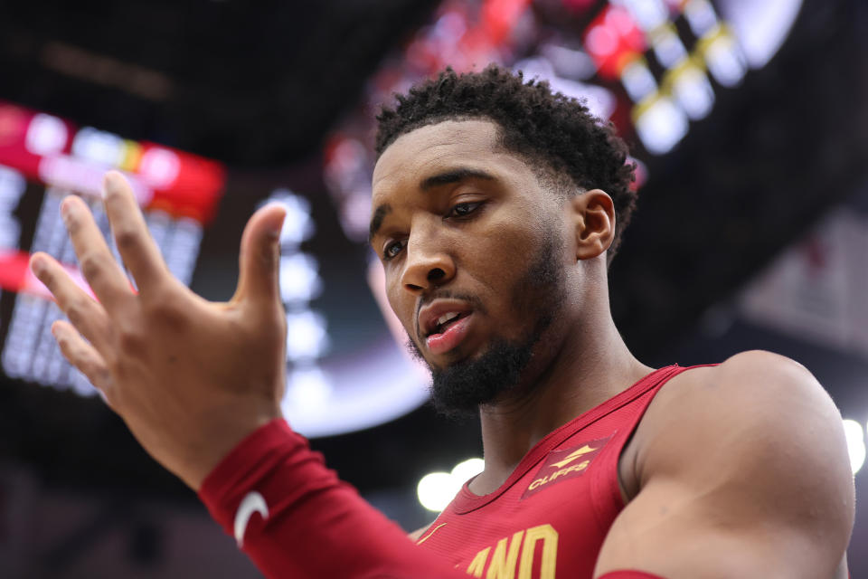 Cleveland Cavaliers guard Donovan Mitchell gives his off hand a heat check during his 71-point performance against the Chicago Bulls on Monday. (Michael Reaves/Getty Images)