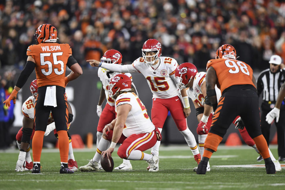 Kansas City Chiefs quarterback Patrick Mahomes (15) will be trying to diagnose the Bengals' complex defense on Sunday. (AP Photo/Emilee Chinn)