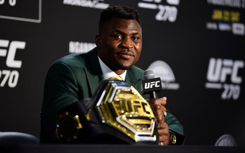 Champion Cameroon's Francis Ngannou takes questions in the press room after defeating French Cyril Gane in their UFC 270 championship fight in Anaheim on January 22, 2022. (Photo by Frederic J. BROWN / AFP) (Photo by FREDERIC J. BROWN/AFP via Getty Images)