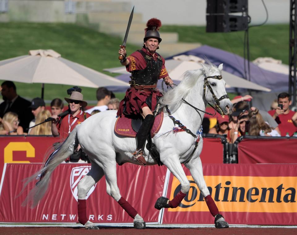 USC Trojans white horse mascot Traveler with rider Hector Aguilar.