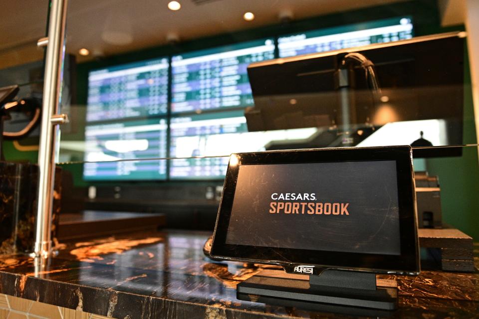 A tablet sits the betting window inside Caesars Sportsbook inside Rocket Mortgage FieldHouse in Cleveland.