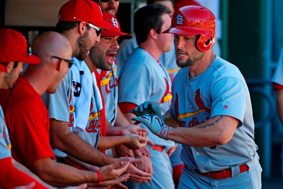 Former St. Louis Cardinal Matt Holliday, right, celebrates with teammates in the dugout after hitting a solo home run against Pittsburgh in 2016. Holliday, the Cardinals Hall of Famer who was announced as the team’s new bench coach Nov. 6, has resigned that position.