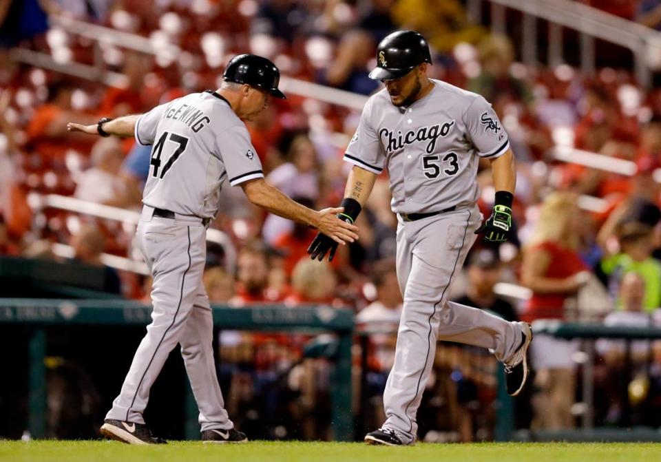 Then-Chicago White Sox third base coach Joe McEwing congratulates Melky Cabrera while rounding the bases after hitting a solo home run against the St. Louis Cardinals in 2015. McEwing, a former Cardinal, has been hired as the organization’s new bench coach following the abrupt departure of Matt Holliday, also a former Redbird.