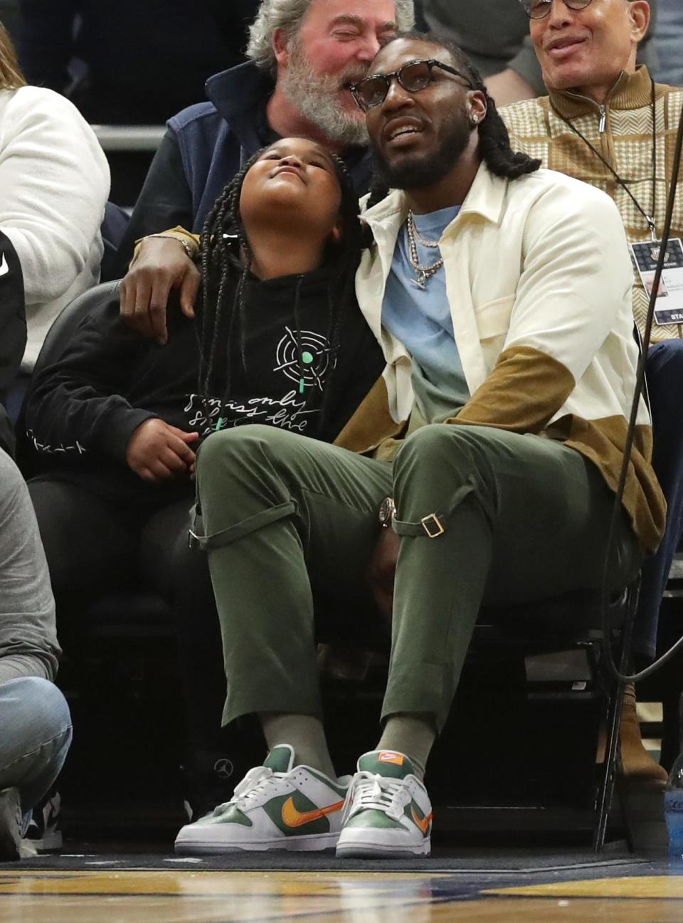 Former Marquette basketball star and current Phoenix Suns player Jae Crowder is shown during the first half of the Marquette-St. John's game on Saturday, March 5, 2022, at Fiserv Forum in Milwaukee. Crowder has not played this season.