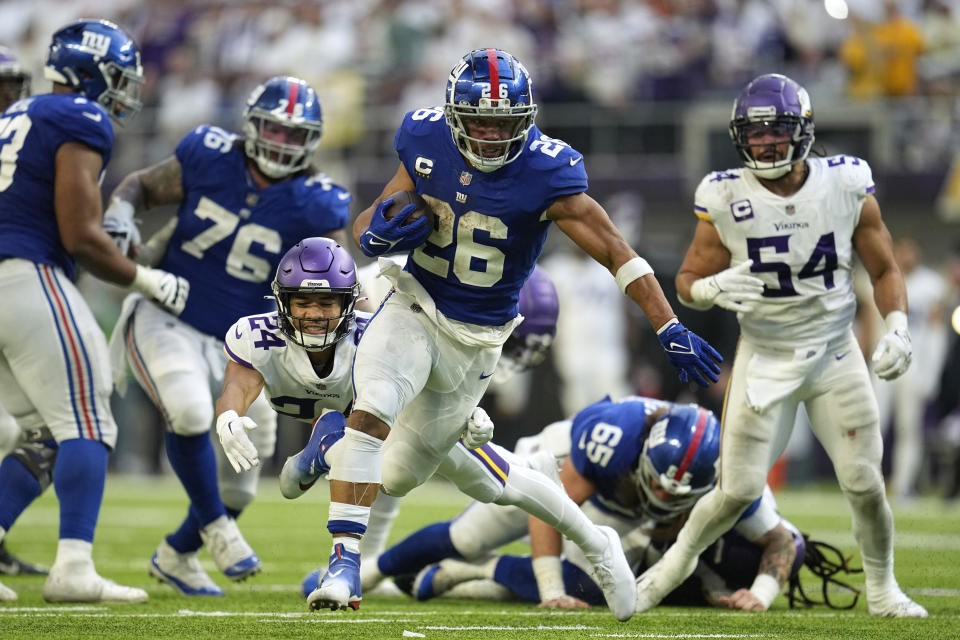 New York Giants running back Saquon Barkley (26) and his team get another shot at the Minnesota Vikings this week. (AP Photo/Abbie Parr)