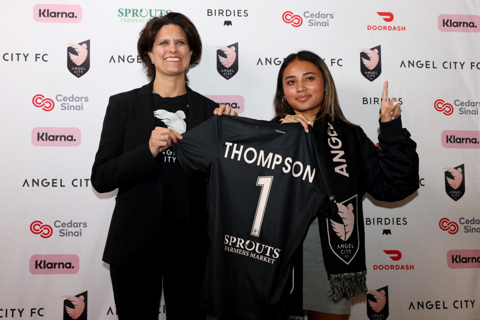 PLAYA VISTA, CALIFORNIA - JANUARY 12: Angel City Football Club President Julie Uhrman and first overall draft pick Alyssa Thompson pose with a jersey during the Angel City Football Club 2023 NWSL Draft Party at Nike LA on January 12, 2023 in Playa Vista, California. (Photo by Katelyn Mulcahy/Getty Images)