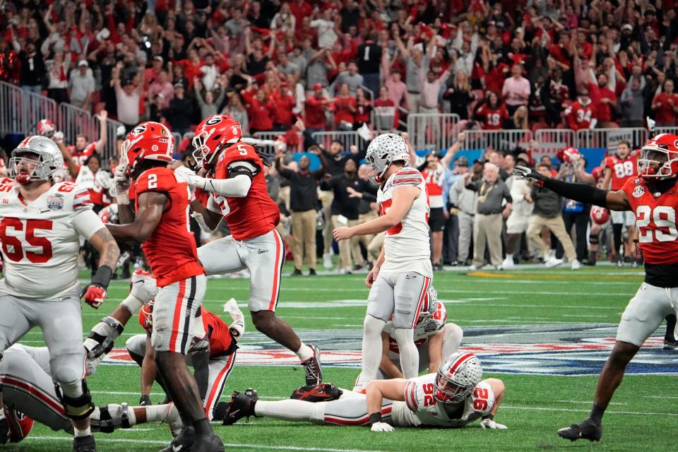 Dec 31, 2022; Atlanta, Georgia, USA; Ohio State Buckeyes place kicker Noah Ruggles (95) misses a 50 yard field goal in the final seconds of the second half of the Peach Bowl against the Georgia Bulldogs in the College Football Playoff semifinal at Mercedes-Benz Stadium. Mandatory Credit: Adam Cairns-The Columbus Dispatch