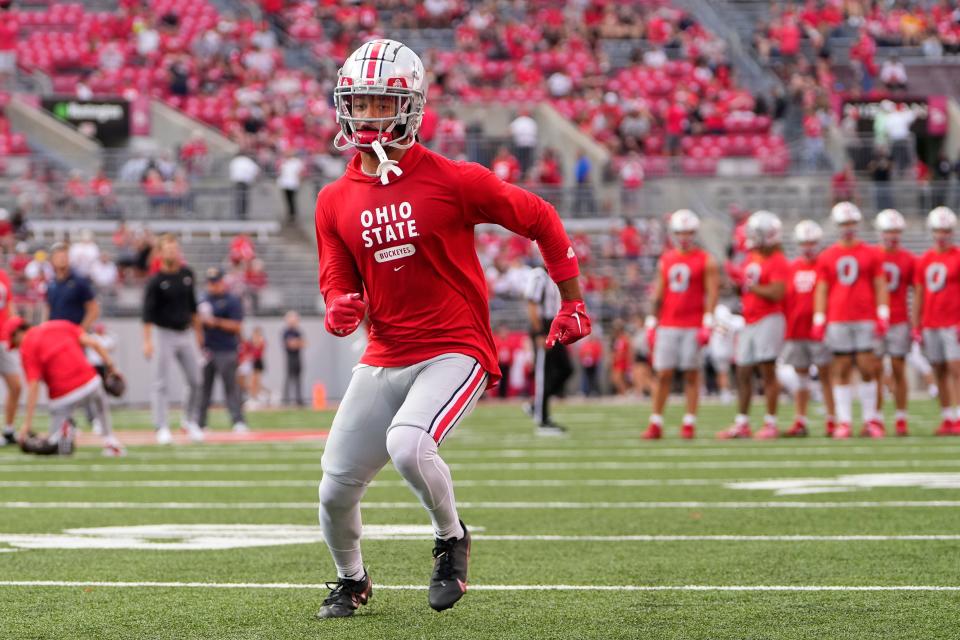 Sep 17, 2022; Columbus, Ohio, USA; Ohio State Buckeyes wide receiver Jaxon Smith-Njigba (11) warms up prior to the NCAA Division I football game against the Toledo Rockets at Ohio Stadium. Mandatory Credit: Adam Cairns-The Columbus Dispatch