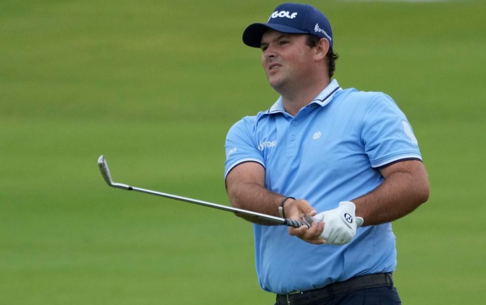 Patrick Reed plays his second shot on the 8th hole during the first round of the Dubai Desert Classic - Kamran Jebreili/AP