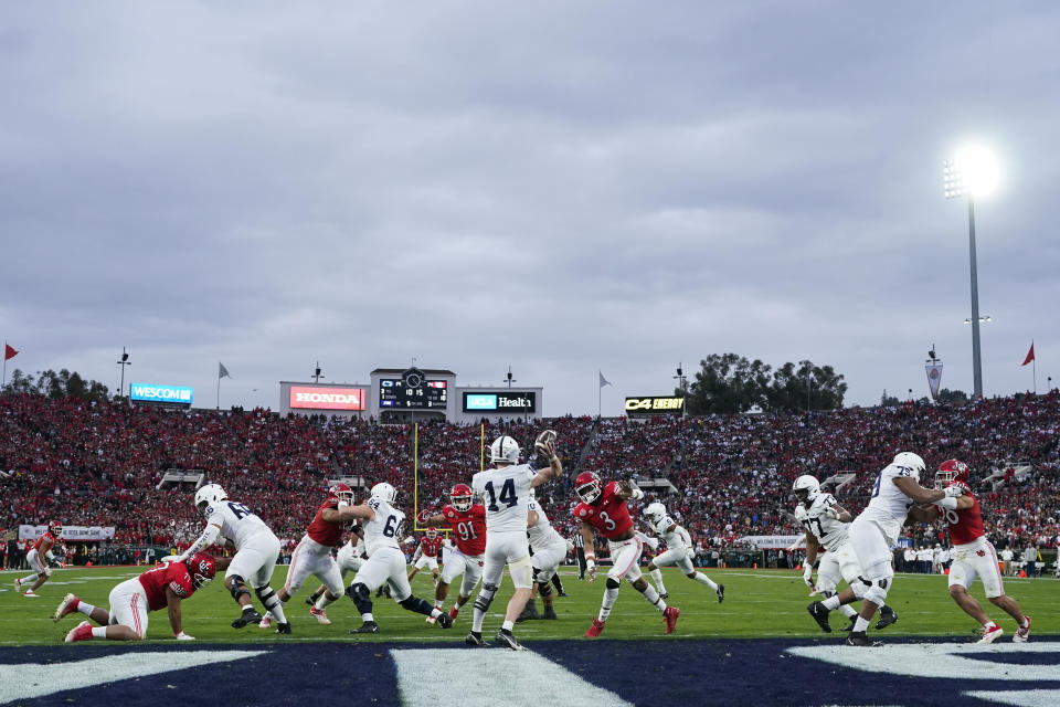 Penn State quarterback Sean Clifford (14) throws a pass during the second half in the Rose Bowl NCAA college football game against Utah Monday, Jan. 2, 2023, in Pasadena, Calif. (AP Photo/Marcio Jose Sanchez)