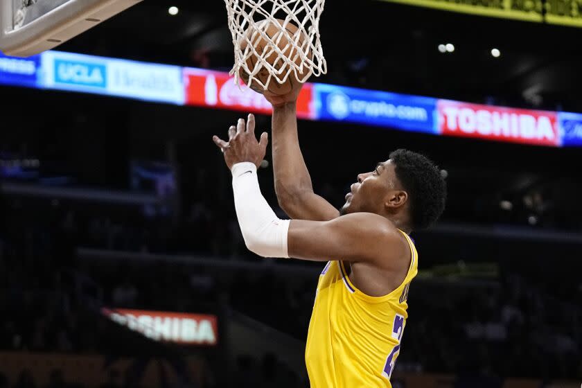 Los Angeles Lakers forward Rui Hachimura shoots during the first half of an NBA basketball game against the San Antonio Spurs Wednesday, Jan. 25, 2023, in Los Angeles. (AP Photo/Mark J. Terrill)