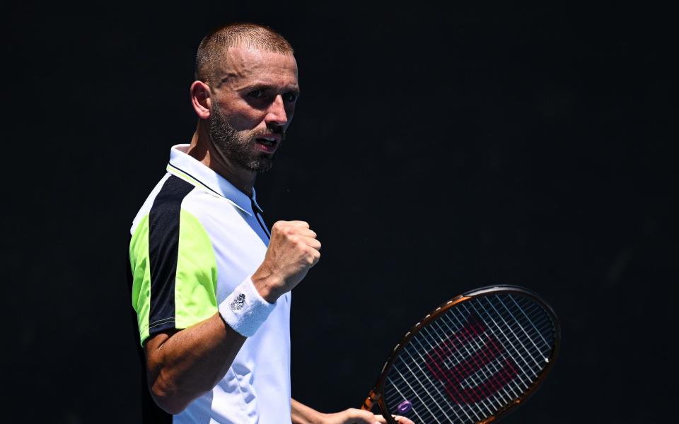 Dan Evans celebrates with a clenched fist - GETTY