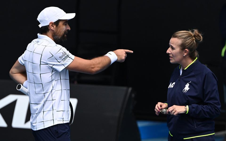 Jeremy Chardy of France speaks to chair umpire Miriam Bley - Quinn Rooney/Getty