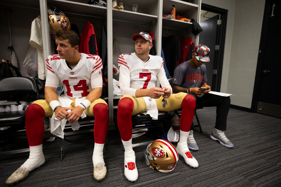 MINNEAPOLIS, MN - AUGUST 20: Brock Purdy #14, Nate Sudfeld #7 and Trey Lance #5 of the San Francisco 49ers in the locker room before the game against the Minnesota Vikings at U.S. Bank Stadium on August 20, 2022 in Minneapolis, Minnesota. The 49ers defeated the Vikings 17-7. (Photo by Michael Zagaris/San Francisco 49ers/Getty Images)