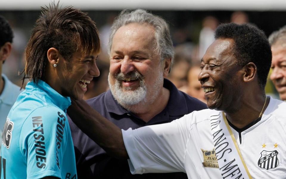  Soccer player Neymar, left, and Brazalian soccer legend Pele, share a laugh during a centennial anniversary celebration of the team in Santos - AP Photo/Nelson Antoine, File