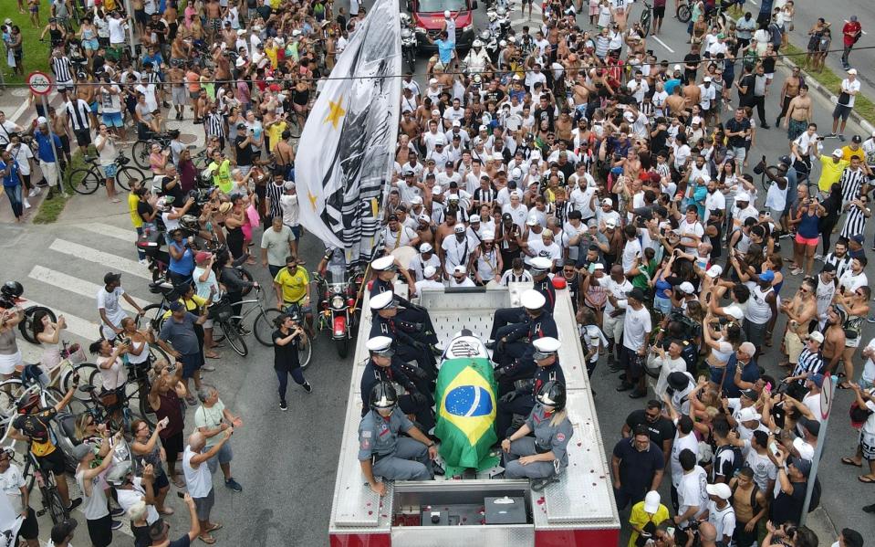 A fire engine carrying the coffin with Pele leads the funeral procession in Santos, Brazil, 03 January 2023. Brazilian soccer legend Pele - Antonio Lacerda/EPA-EFE/Shutterstock