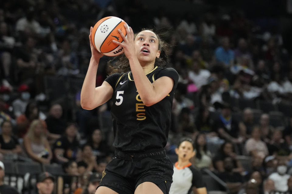 Las Vegas Aces' Dearica Hamby (5) plays against the Dallas Wings in an WNBA basketball game Sunday, June 5, 2022, in Las Vegas. (AP Photo/John Locher)