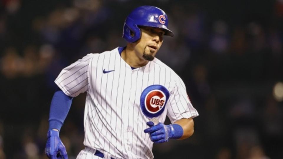 Chicago Cubs left fielder Rafael Ortega (66) rounds the bases after hitting a solo home run against the Cincinnati Reds during the eighth inning at Wrigley Field