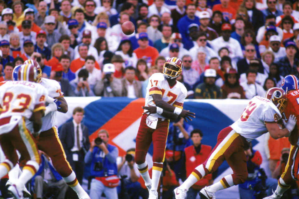 SAN DIEGO - JANUARY 31: Quarterback Doug Williams #17 of the Washington Redskins passes during Super Bowl XXII against the Denver Broncos at Jack Murphy Stadium on January 31, 1988 in San Diego, California. The Redskins won 42-10. (Photo by Stephen Dunn/Getty Images)