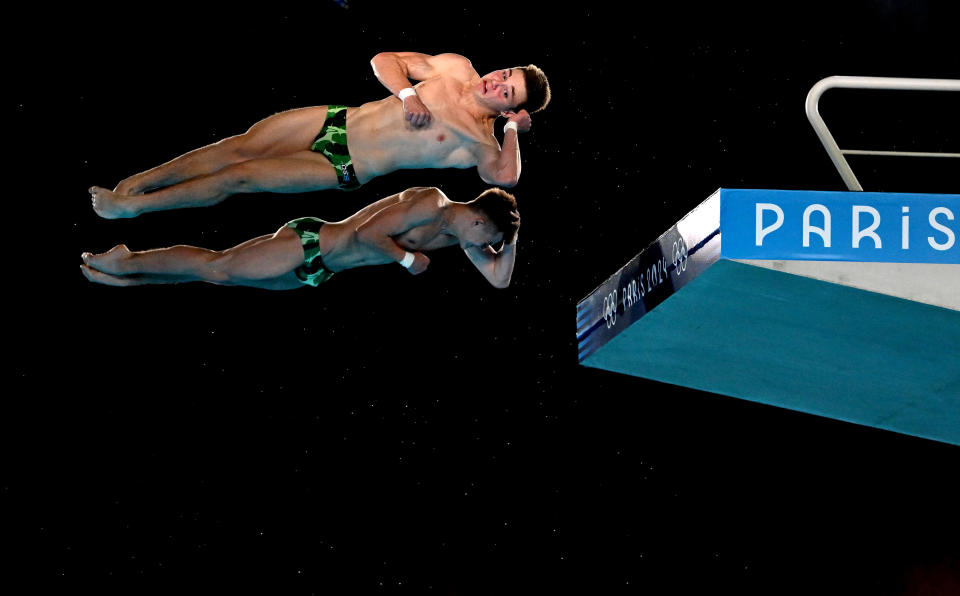 Kirill Boliukh and Oleksii Sereda of Ukraine perform during the men’s synchronized 10m platform final at the Paris Olympics. (Patrick Khachfe/Getty Images)