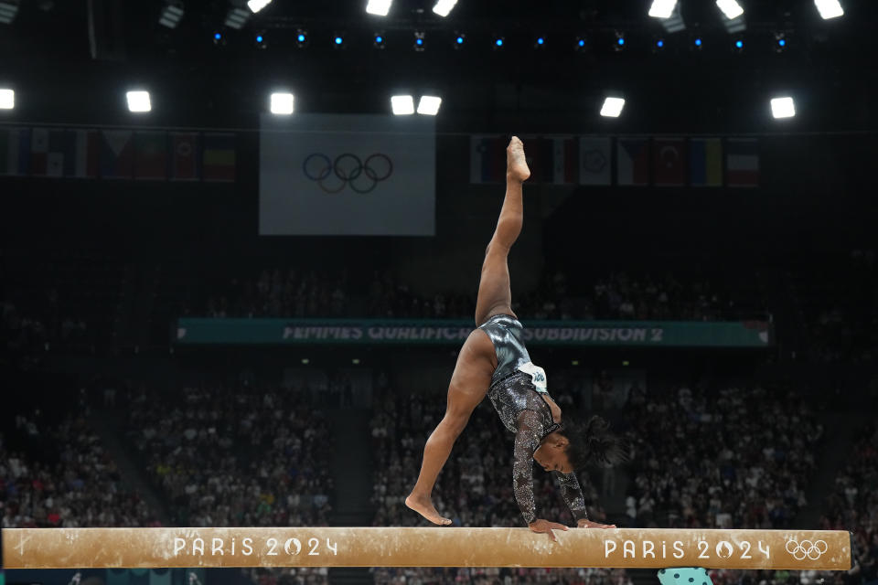 Gymnastics: 2024 Summer Olympics: USA Simone Biles in action, performs on the Balance beam during Women's Qualification at Bercy Arena. Paris, France 7/28/2024
CREDIT: Erick W. Rasco (Photo by Erick W. Rasco/Sports Illustrated via Getty Images) (Set Number: X164555 TK1)