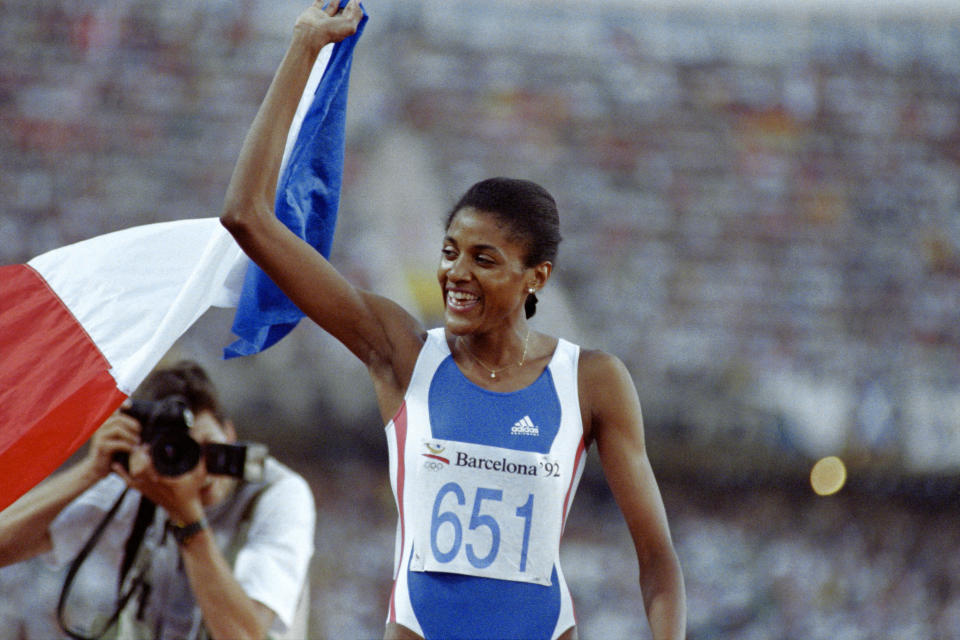 French Marie-José Pérec jubilates on August 05, 1992 after her victory in the 400-meter race during the Barcelona Olympic Games. (Photo by AFP) (Photo by STF/AFP via Getty Images)