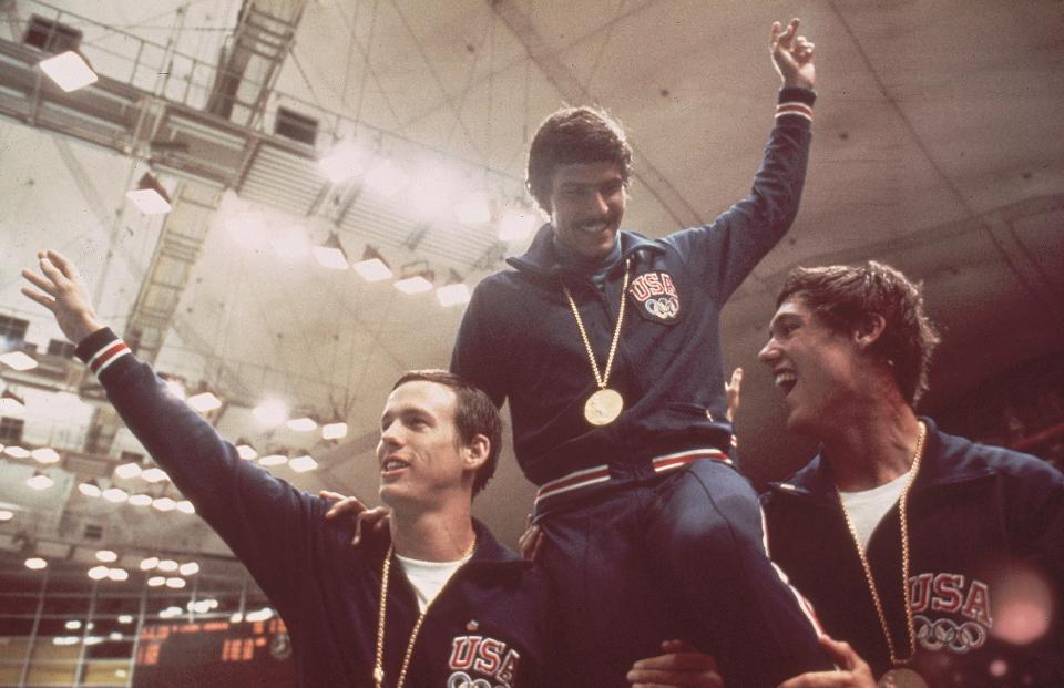 UNSPECIFIED - AUGUST 26: Swimming: 1972 Summer Olympics, USA Mark Spitz victorious getting carried off field by teammates after winning gold medal in relay event, Munich, FRG 8/26/1972--9/11/1972 (Photo by Heinz Kluetmeier/Sports Illustrated via Getty Images) (SetNumber: X17073)