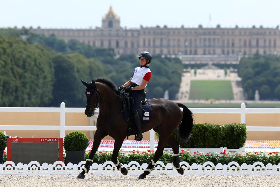 PARIS, FRANCE - JULY 25: Elisabeth Halliday and horse Cooley Nutcracker of Team United States practice dressage during an Equestrian Eventing training session ahead of the Paris 2024 Olympics Games at Chateau de Versailles on July 25, 2024 in Versailles, France. (Photo by Mike Hewitt/Getty Images)