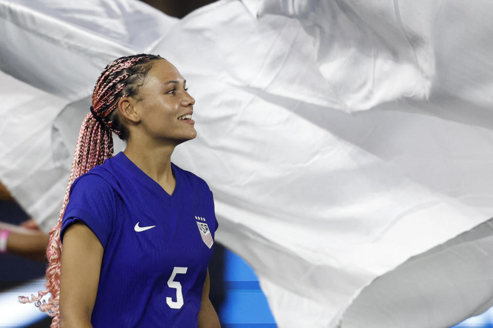 Jul 16, 2024; Washington, D.C., USA; United States forward Trinity Rodman (5) walks back onto the pitch during a send-off ceremony after a friendly against Costa Rica at Audi Field. Mandatory Credit: Geoff Burke-USA TODAY