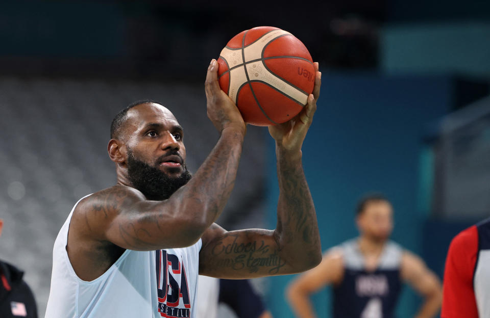 US forward LeBron James (C) takes part in a training session at the Pierre-Mauroy stadium in Villeneuve-d'Ascq, northern France, on July 24, 2024, ahead of the Paris 2024 Olympic games. (Photo by Thomas COEX / AFP) (Photo by THOMAS COEX/AFP via Getty Images)