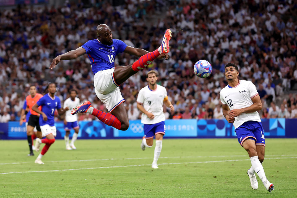 France’s Jean-Philppe Mateta takes a shot against the Americans. (Alex Livesey/Getty Images)