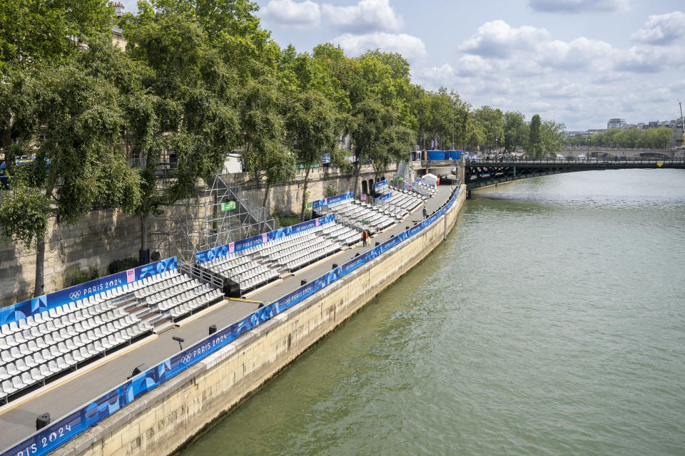 Temporary seats installed along the Seine. (Hans Lucas/AFP via Getty Images)