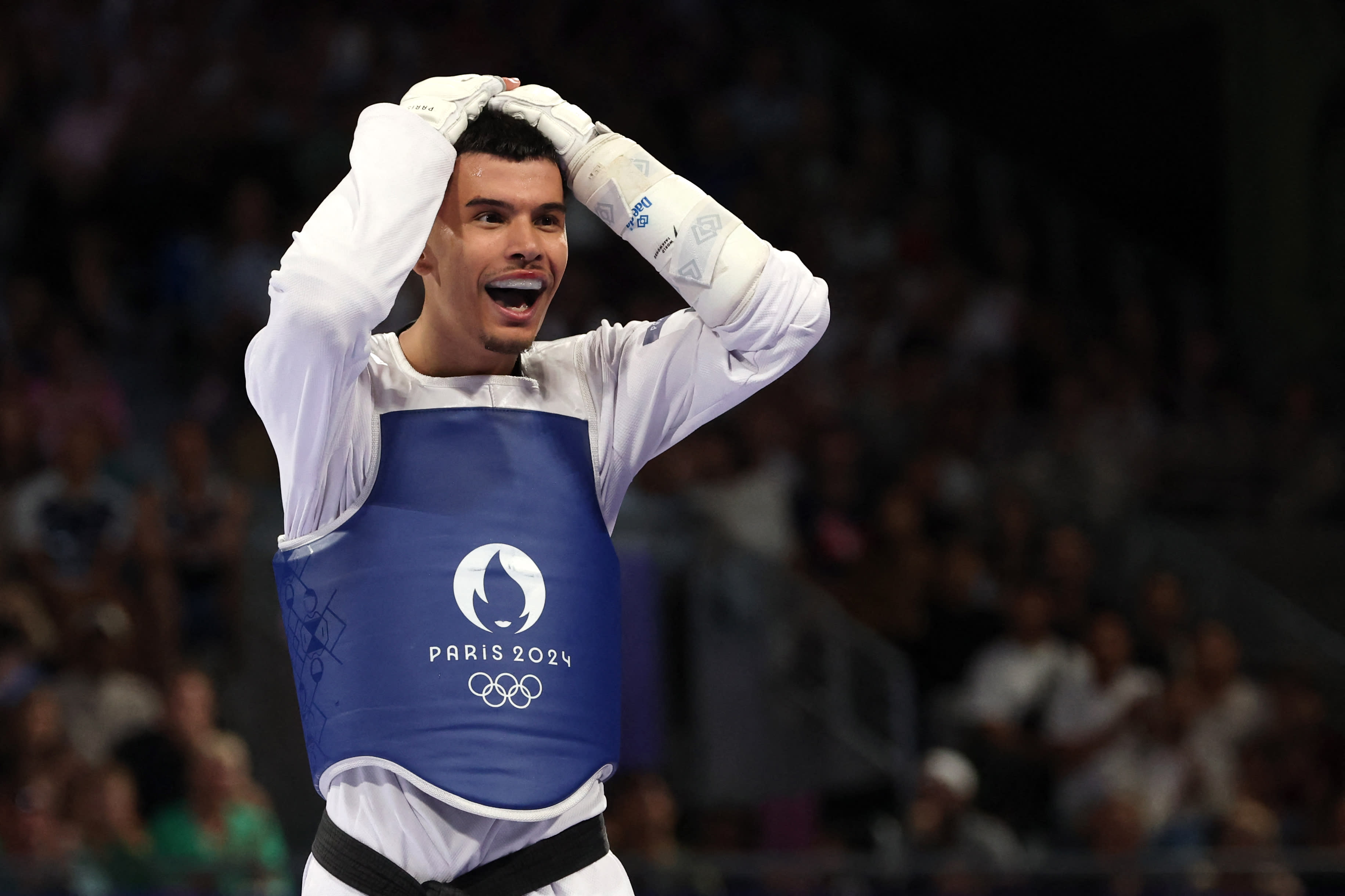 Denmark's Edi Hrnic celebrates after winning against South Korea's Seo Geon-woo in the taekwondo men's -80kg bronze medal bout of the Paris 2024 Olympic Games at the Grand Palais in Paris on August 9, 2024. (David Gray/AFP/Getty Images)