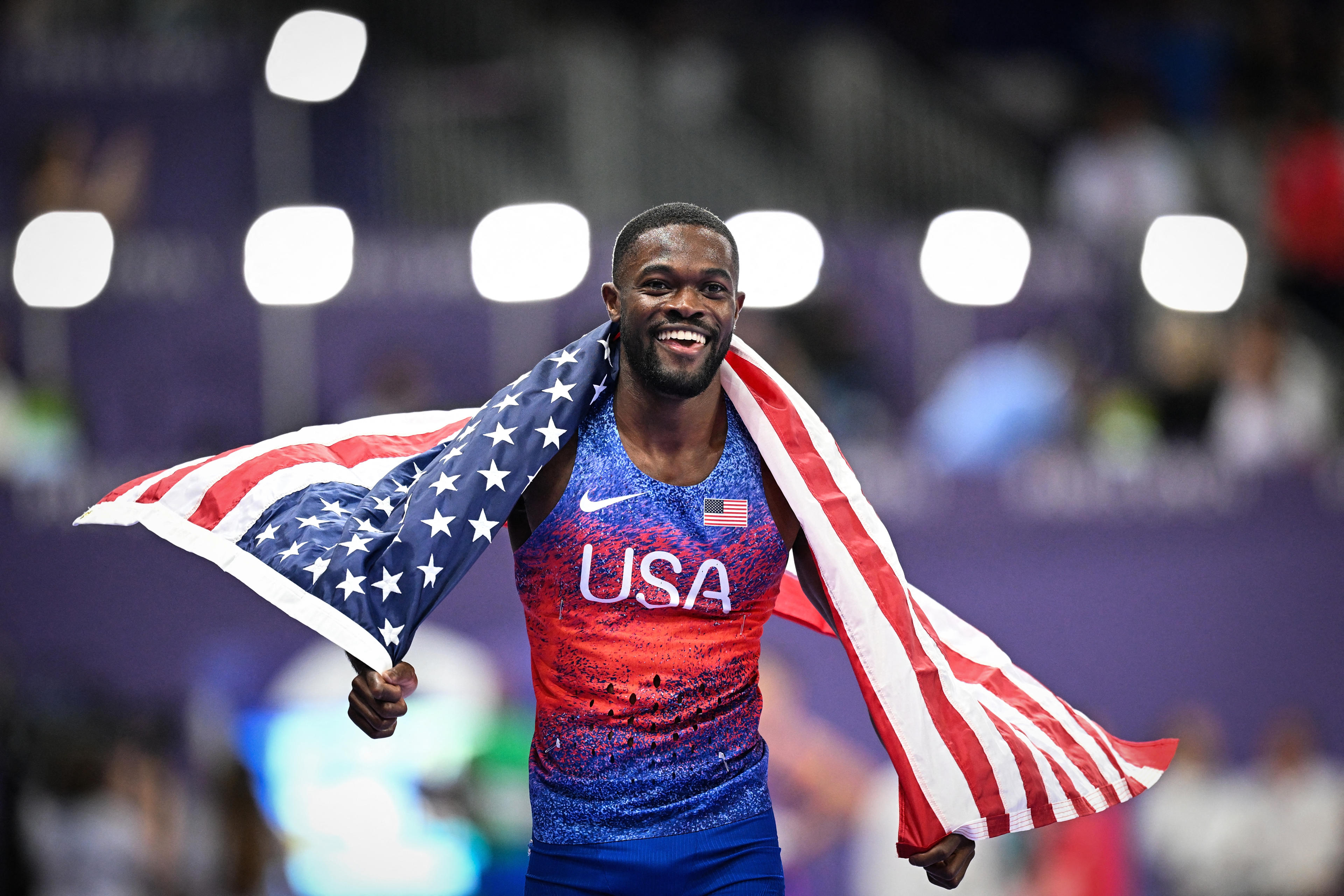 US' Rai Benjamin celebrates after winning the men's 400m hurdles final of the athletics event at the Paris 2024 Olympic Games at Stade de France in Saint-Denis, north of Paris, on August 9, 2024. (Kirill Kudryavtsev/AFP/Getty Images)