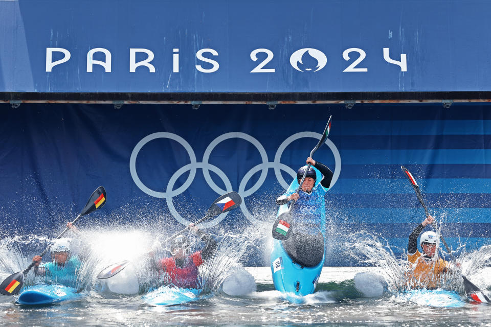 Elena Lilik of Team Germany (L), Antonie Galuskova of Team Czechia, Stefanie Horn of Team Italy and Klaudia Zwolinska of Team Poland compete during the Canoe Slalom Women's Kayak Cross Heats on day nine of the Olympic Games Paris 2024 at Vaires-Sur-Marne Nautical Stadium on August 04, 2024 in Paris, France. (Photo by Justin Setterfield/Getty Images)