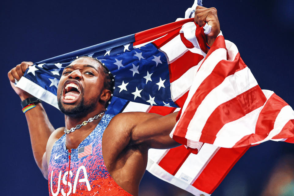 USA's Noah Lyles celebrates winning the gold medal in the 100 meters. (Patrick Smith/Getty Images)