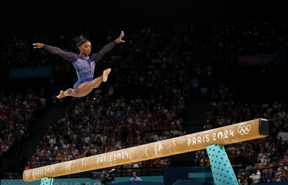 PARIS, FRANCE - AUGUST 01: Simone Biles of Team United States competes on the balance beam during the Artistic Gymnastics Women's All-Around Final on day six of the Olympic Games Paris 2024 at Bercy Arena on August 01, 2024 in Paris, France. (Photo by Jamie Squire/Getty Images)