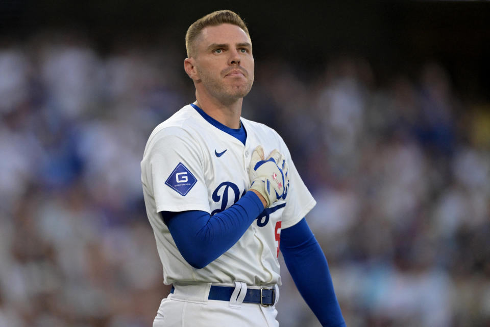 Aug 5, 2024; Los Angeles, California, USA; Los Angeles Dodgers first baseman Freddie Freeman (5) acknowledges the crowd as he got a standing ovation as he approached the plate for his first at bat against the Philadelphia Phillies at Dodger Stadium. Mandatory Credit: Jayne Kamin-Oncea-USA TODAY Sports