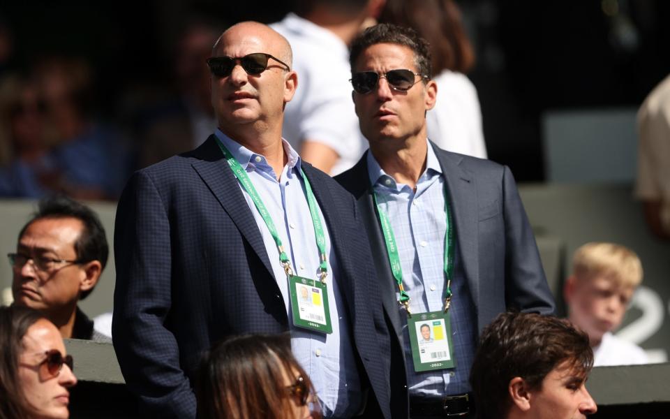 Max Eisenbud, agent and Mark Shapiro watch Emma Raducanu of Great Britain against Alison Van Uytvanck of Belgium in the Women's Singles First Round match during Day One of The Championships Wimbledon 2022 at All England Lawn Tennis and Croquet Club on June 27, 2022 in London, England