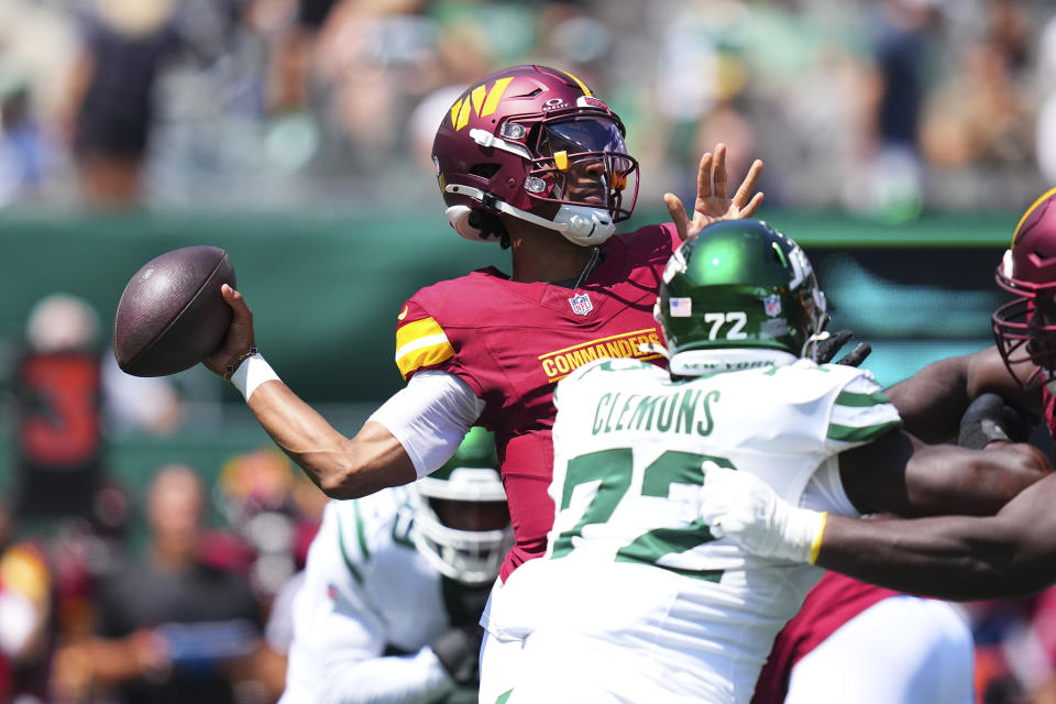 Jayden Daniels' first professional completion was a thing to behold. (Photo by Mitchell Leff/Getty Images)